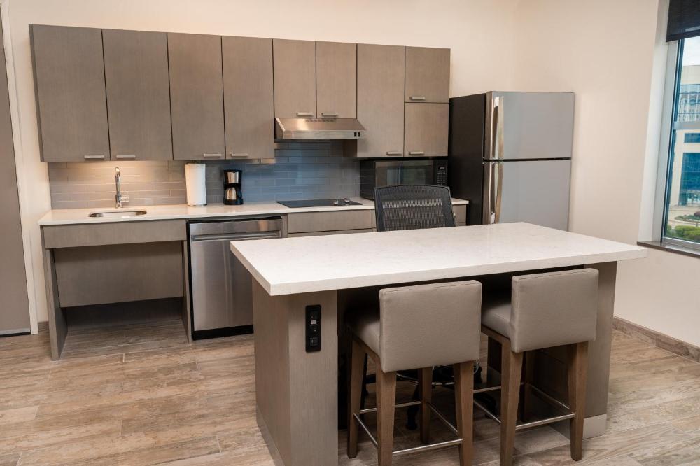 One-Bedroom King Suite with Sofa Bed, Kitchen and Tub - Disability Access interior